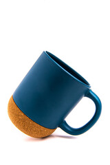 blue thermo mug with a cork bottom on a white background