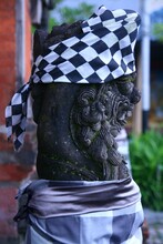 Stone Statue With Balinese Cloth. Focus Selected