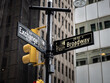 New York City street sign between Exchange and Broadway