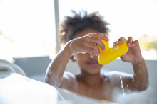 Girl In Bubble Bath With Rubber Duck