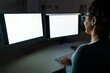 © Westend61 - Freelancer working on two monitors at home office