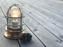 Old Oil Lamp On Wooden Background