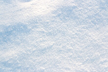 White Snow Background With Blurring Back And Beautiful Light