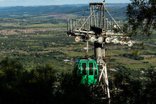 Empty Green Cable Car Going Up Magaliesberg Mountain Range Near Hartbeespoort Dam, South Africa