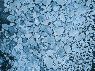 aerial drone view on ice floes on ocean surface in norways arctic sea