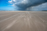Fototapeta Na sufit - Strand auf Juist bei Sturm mit wegtreibenden Sand