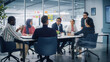 © Gorodenkoff - Multi-Ethnic Office Conference Room Meeting: Diverse Team of Young Entrepreneurs, Specialists Talk, Use TV for infographics. Smiling Businesspeople Discuss Investment Strategy in e-commerce Startup