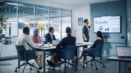 Poster - Diverse Modern Office: Motivated Latin Businessman Leads Business Meeting with Managers, Talks about Company Growth, Uses TV for Presentation. Creative Digital Entrepreneurs Work on e-Commerce Project