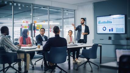 Poster - Diverse Modern Office: Businessman Leads Business Meeting with Managers, Talks, uses Presentation TV with Statistics, Infographics. Digital Entrepreneurs Work on e-Commerce Project.