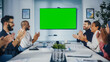 © Gorodenkoff - Modern Multi-Ethnic Office Conference Room Meeting: Diverse Team of Successful Managers, Executives Use Green Screen Chroma Key TV, Celebrate and Applaud Successful e-Commerce Product Release