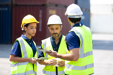 Wall Mural - Ethnic diversity worker people, Success teamwork. Group of professional engineering people wearing hardhat safety helmet meeting and working with digital teblet.