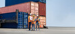 © NVB Stocker - Hispanic man harbor worker talking on the walkie-talkie radio and control loading containers at container warehouse. container yard port of import and export goods