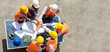 © NVB Stocker - Ethnic diversity worker people, Success teamwork. Group of professional engineering people wearing hardhat safety helmet meeting with solar photovoltaic panels discussion in new project