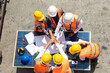 © NVB Stocker - Ethnic diversity worker people, Success teamwork. Group of professional engineering people wearing hardhat safety helmet meeting with solar photovoltaic panels discussion in new project