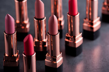Lipsticks On A Black Background