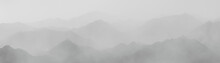 Misty Mountain Landscape. Mountains In The Fog.  Panorama.