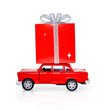 © Anteria - Isolated Red toy car with a large gift box on the roof