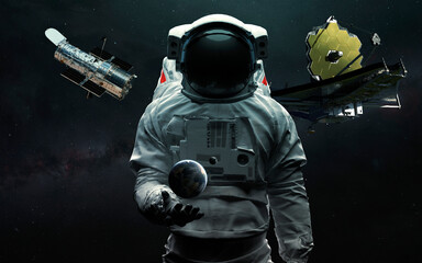 Wall Mural - Astronaut and two telescopes James Webb and Hubble. JWST launch art. Elements of image provided by Nasa