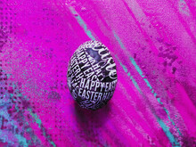 DIY Typographic Eastern Egg On Custom Modern Violet Background With Copyspace ; Custom Made Easter Egg On Violet Abstract Background With Copyspace; 