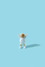 Astronaut Standing Over Blue Background