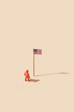 Spaceman Placing American Flag