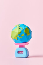Closeup Of Earth Globe On Scales