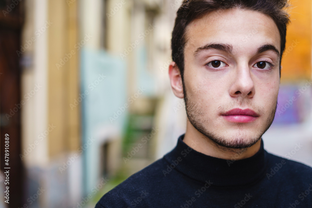 Portrait of a young man on the street Stock Photo | Adobe Stock