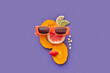 © Yaroslav Danylchenko/Stocksy - Smiley face made of food in sunglasses