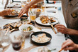 © Melissa Milis Photography/Stocksy - Christmas table with food