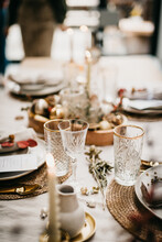 Close Up Of A Christmas Table With Glasses