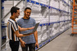 © Raymond Forbes LLC/Stocksy - Workers review data on laptop computer