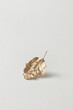 © Yaroslav Danylchenko/Stocksy - One golden leaf on white background