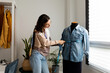 © Valentina Barreto/Stocksy - Woman measuring mannequin chest