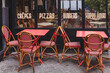 © Anna Berkut/Stocksy - cafe restaurant in Paris with red furniture, France