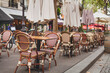 © Anna Berkut/Stocksy - french restaurant, vintage cafe in Paris, France