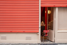 Closed Shop, Red Chair In The Entrance Door