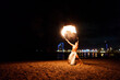 © Igor Kardasov/Stocksy - tribal latino man conducts a fire show