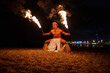 © Igor Kardasov/Stocksy - furious tribal man conducts a fire show
