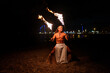 © Igor Kardasov/Stocksy - angry tribal man conducts a fire show