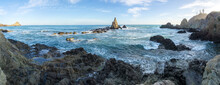 Panoramic View Of Rock Formations Emerging From The Water