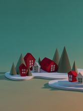 Red Houses Of Paper With Christmas Trees