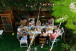 © Tanya Yatsenko/Stocksy - Friends having breakfast in the garden