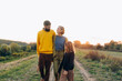 © Studio Firma/Stocksy - Family Walking in Nature