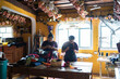 © Santi Nuñez/Stocksy - Seamstresses in a handicraft workshop in Guatemala.