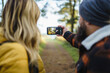 © Daniel Gonzalez/Stocksy - Couple taking selfie on smartphone