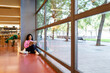 © Valentina Barreto/Stocksy - Woman reading at library