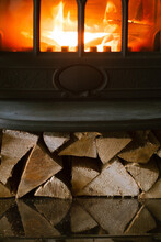 Birch Firewood Under The Fireplace