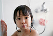 © ChaoShu Li/Stocksy - Cute Asian little girl playing in the bath