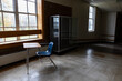 © Raymond Forbes LLC/Stocksy - School Interior with desk in Hallway