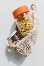 Pasta And Beans In Reusable Glass Jars And Canvas Tote
